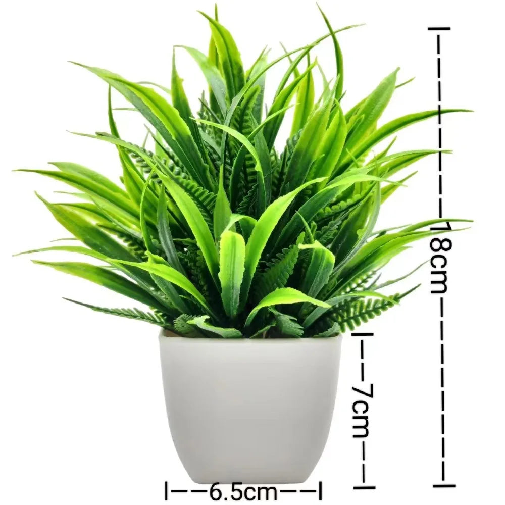 Small artificial potted plant with green foliage in a white pot, view 10