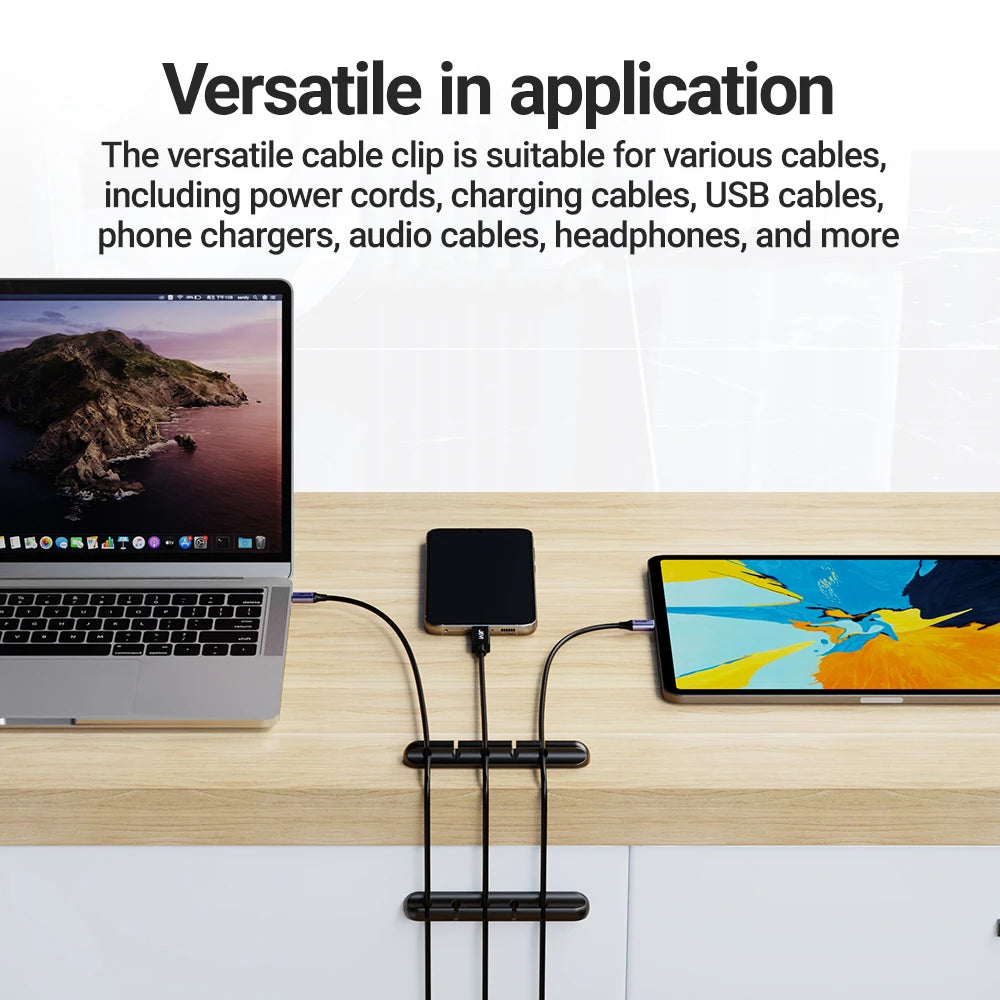 Double sided adhesive backing on the cable clip