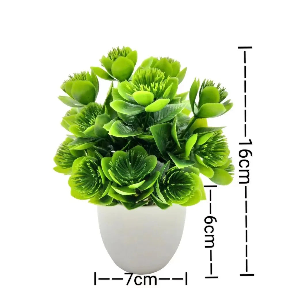 Small artificial potted plant with green foliage in a white pot, view 8