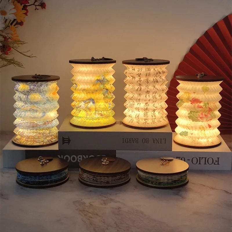 Portable lantern lamp opened out and glowing on a table