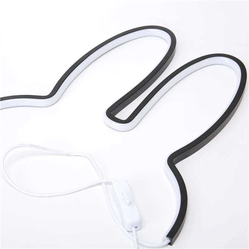 Side view of cute rabbit LED lamp with knob switch