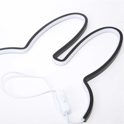 Side view of cute rabbit LED lamp with knob switch