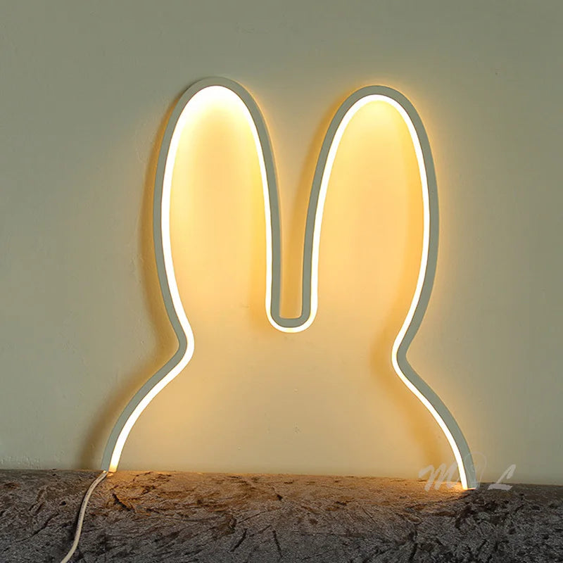 Rabbit LED night light showing warm glow and acrylic design