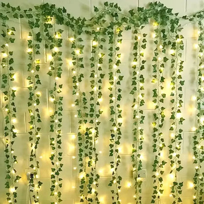 Leaf curtain lights hanging on a bedroom wall with warm white LEDs