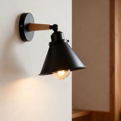 Industrial wall light with wood detail close up