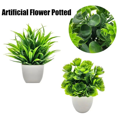 Small artificial potted plant with green foliage in a white pot, view 5
