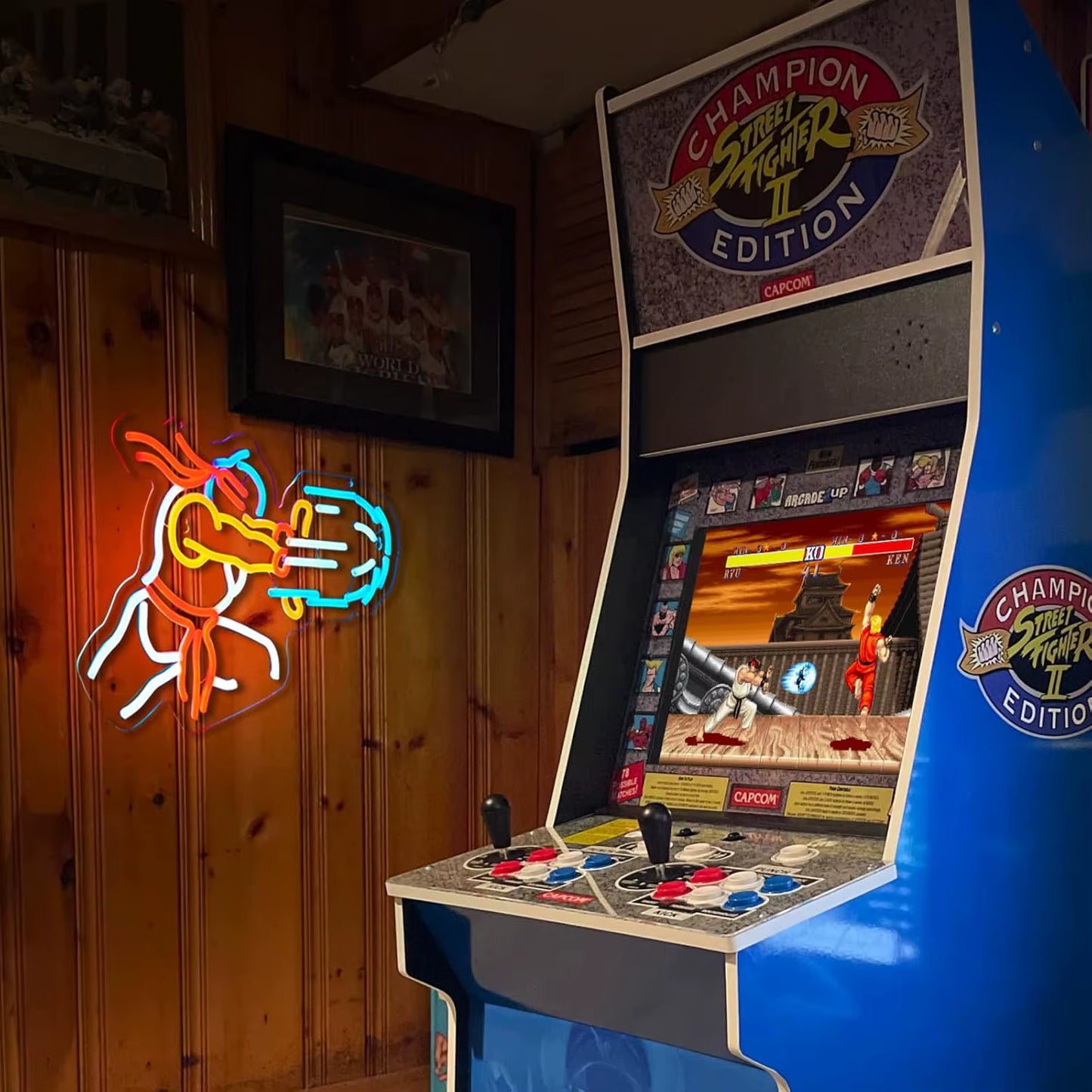 Game Fighter LED neon sign glowing in dark gaming room