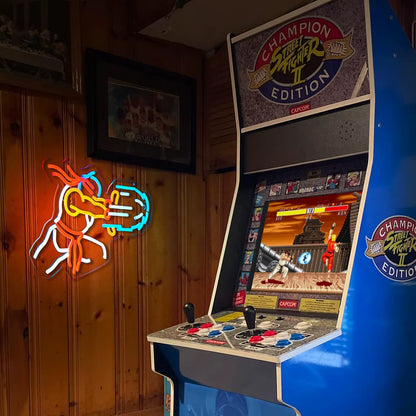 Game Fighter LED neon sign glowing in dark gaming room