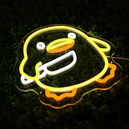 Neon sign shaped like a burger on a dark background