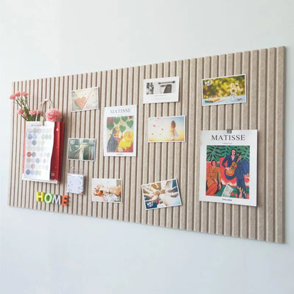 Felt vision board with pinned artwork and reminders