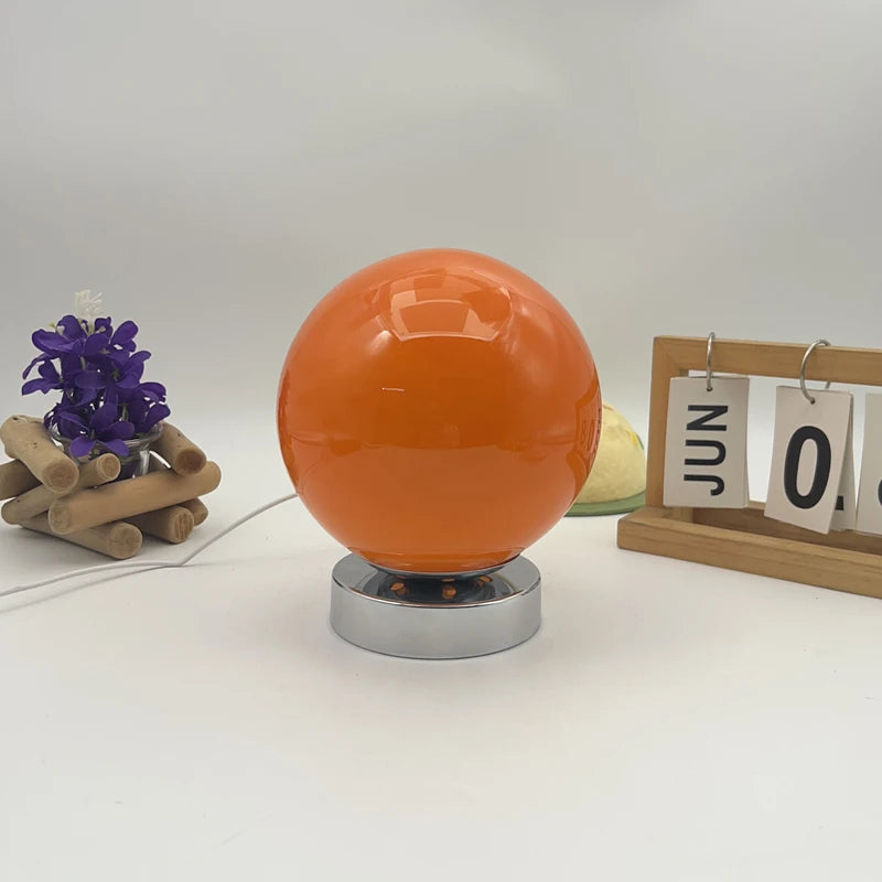Touch switch on the base of the glass table lamp