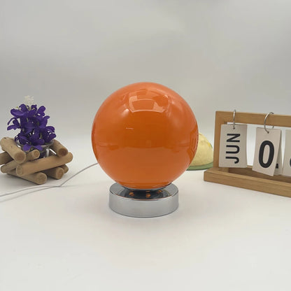Touch switch on the base of the glass table lamp