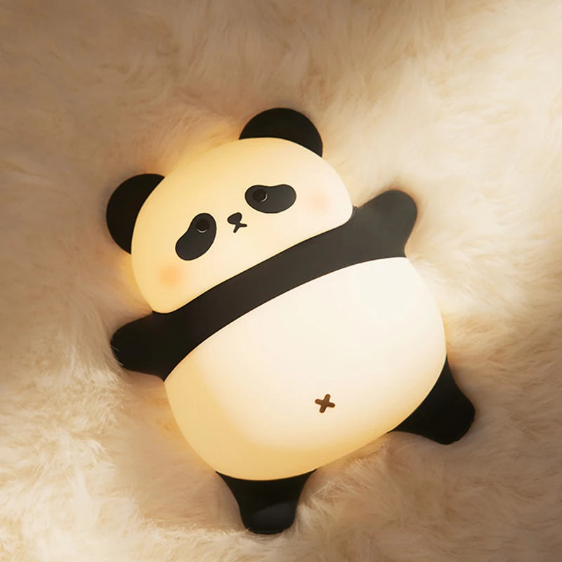 Panda-shaped night light on a soft, beige background