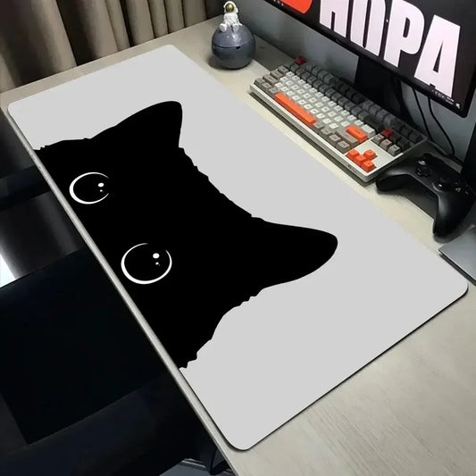 Desk mat printed with small kawaii black cats