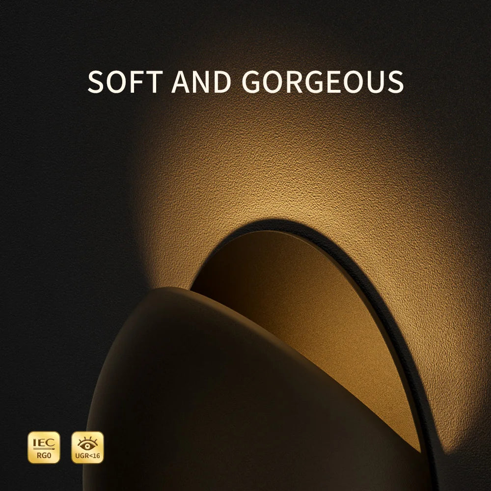 Outdoor wall light shown in rain to demonstrate waterproofing