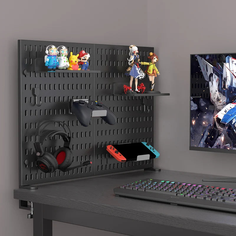 Desktop pegboard organiser set up behind a monitor