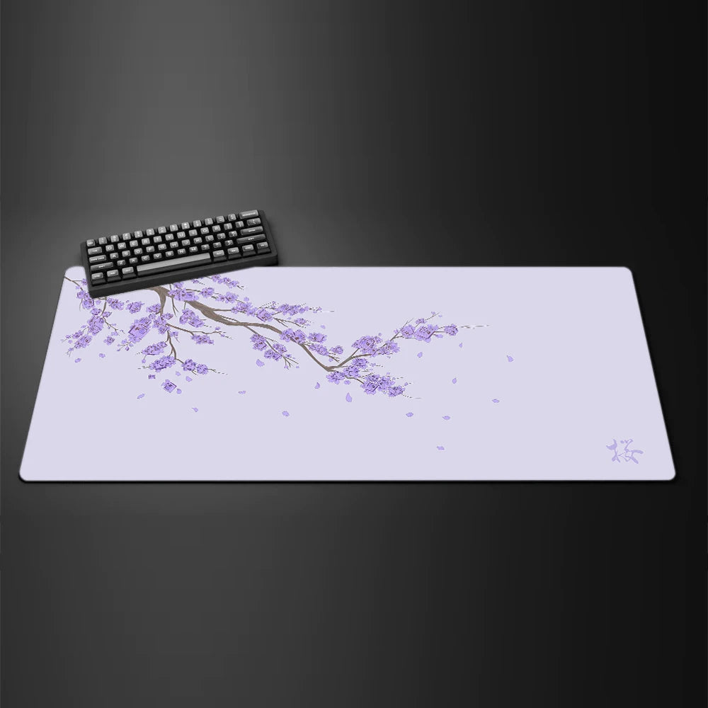 Black desk mat with a purple cherry blossom design, view 5