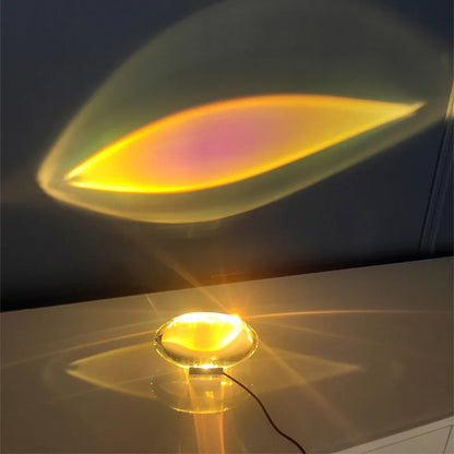 Crystal lamp projecting blue purple halo on wall