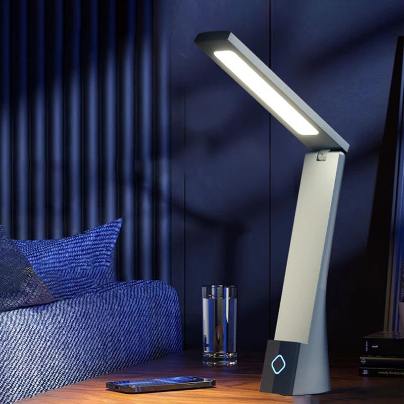 Touch dimmable reading light glowing softly at night