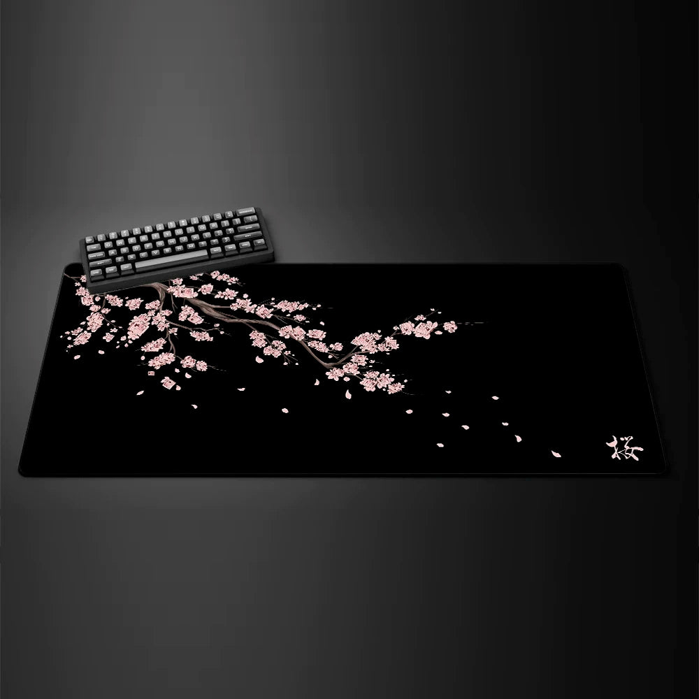 Black desk mat with a purple cherry blossom design, view 10