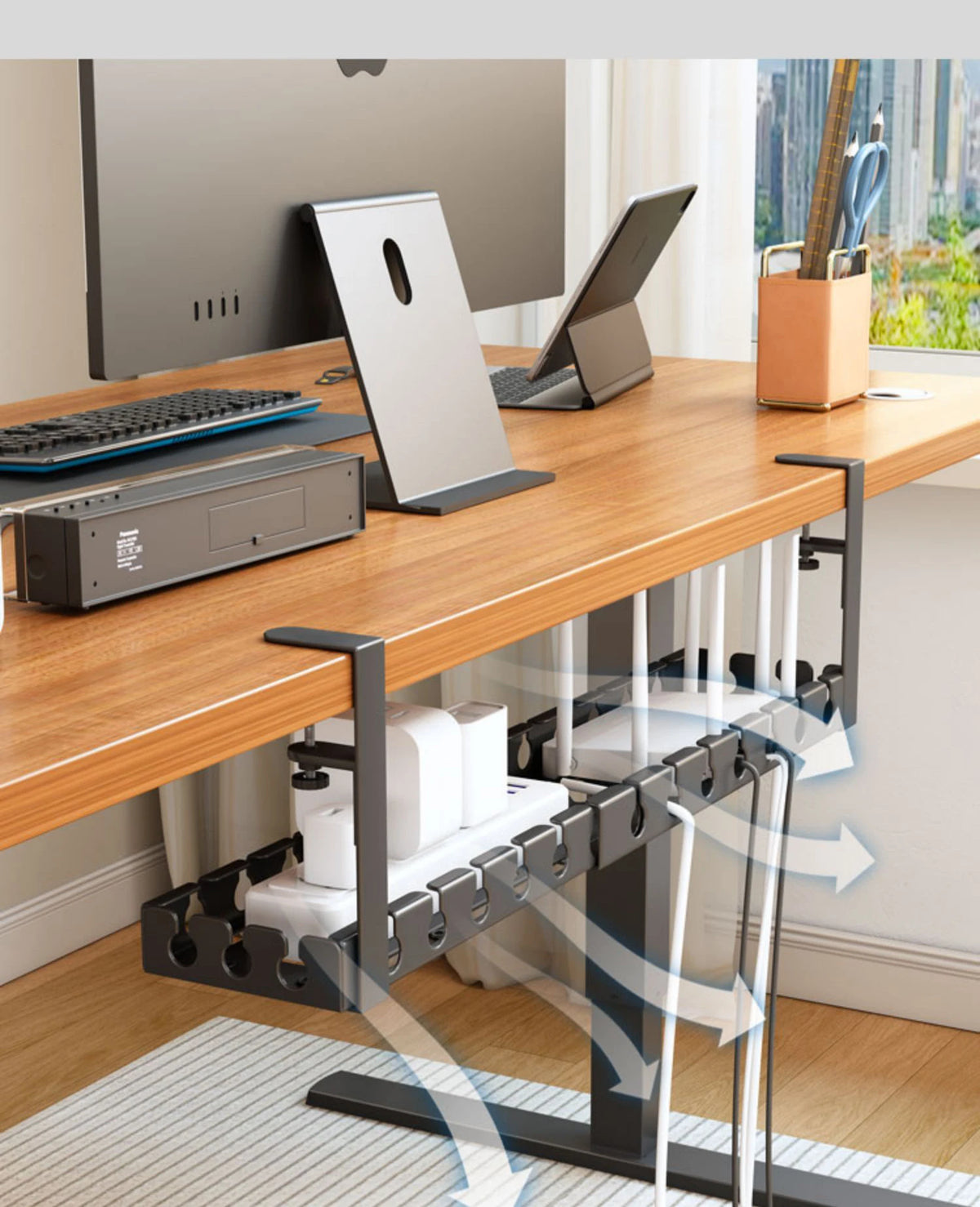 Cable tray fitted under a standing desk