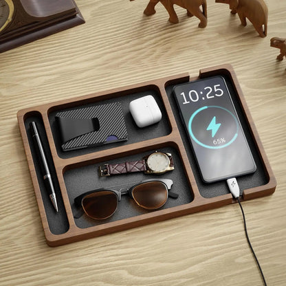 Solid wood desk organiser holding a phone and headphones