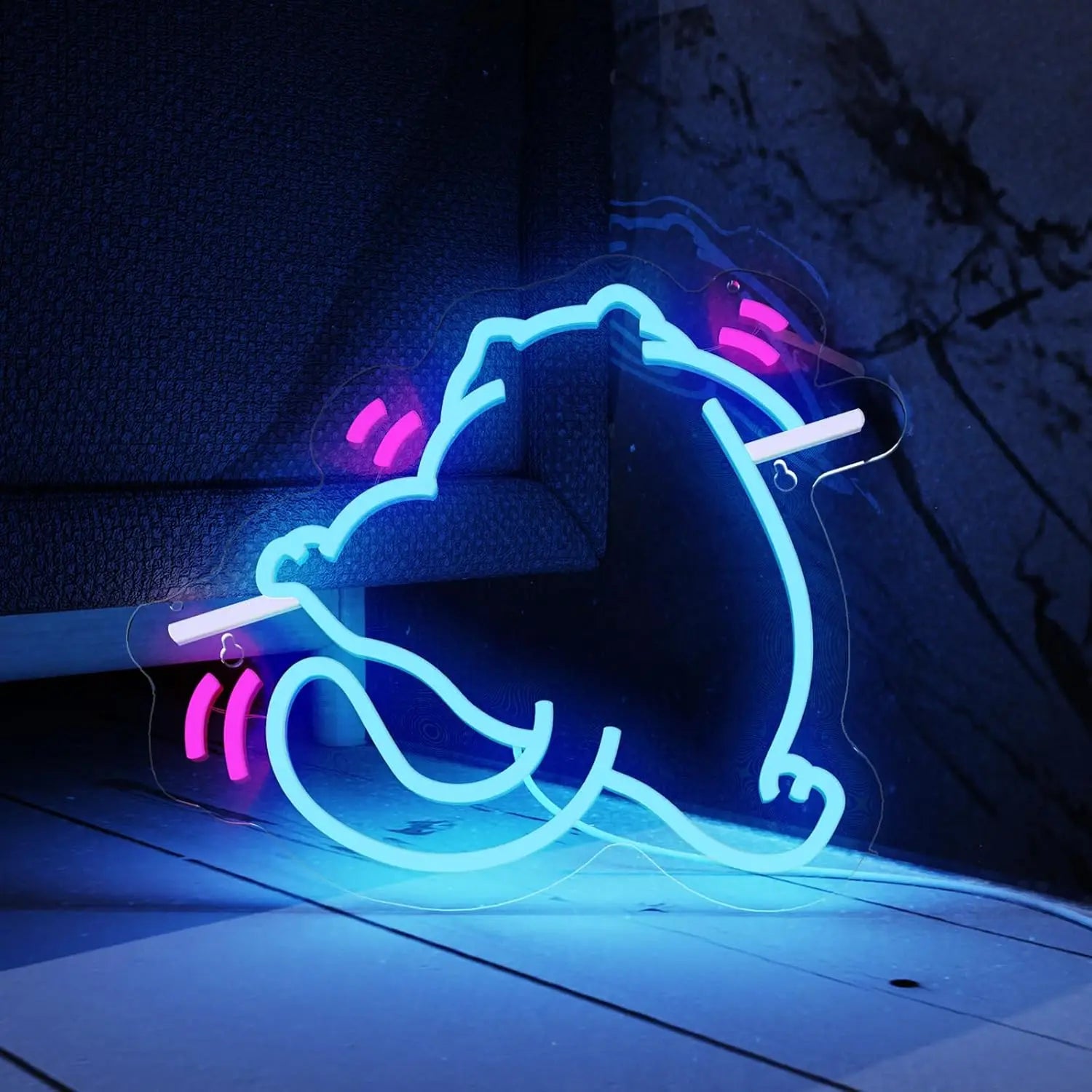 Neon sign shaped like a cartoon character on a dark background