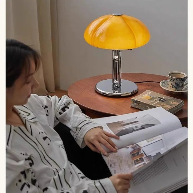 Downward warm light pooling from the mushroom lamp