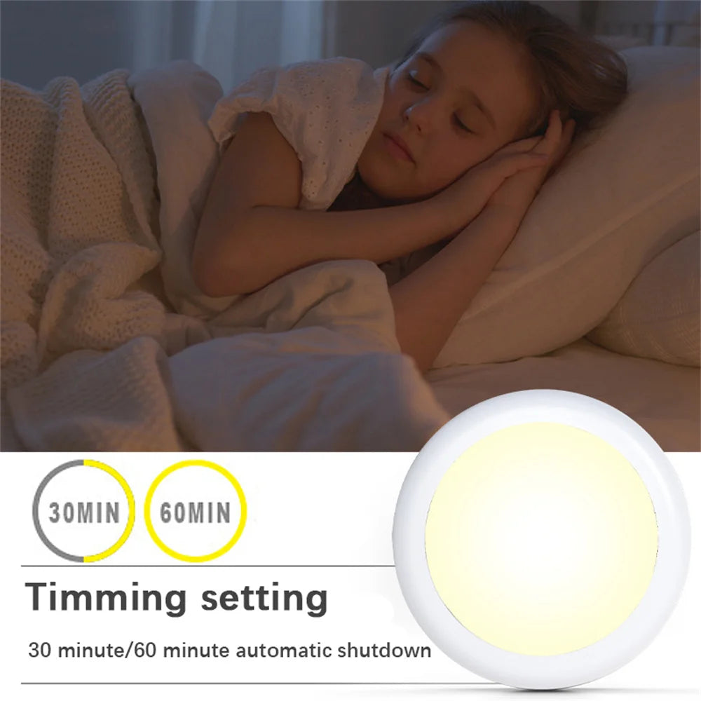 Child sleeping with a night light and timing settings displayed below.