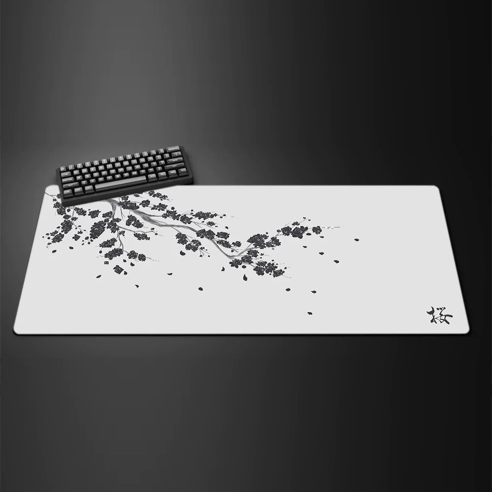Black desk mat with a purple cherry blossom design, view 11