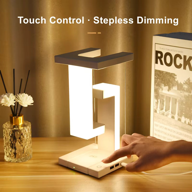 Levitating night light glowing on office desk