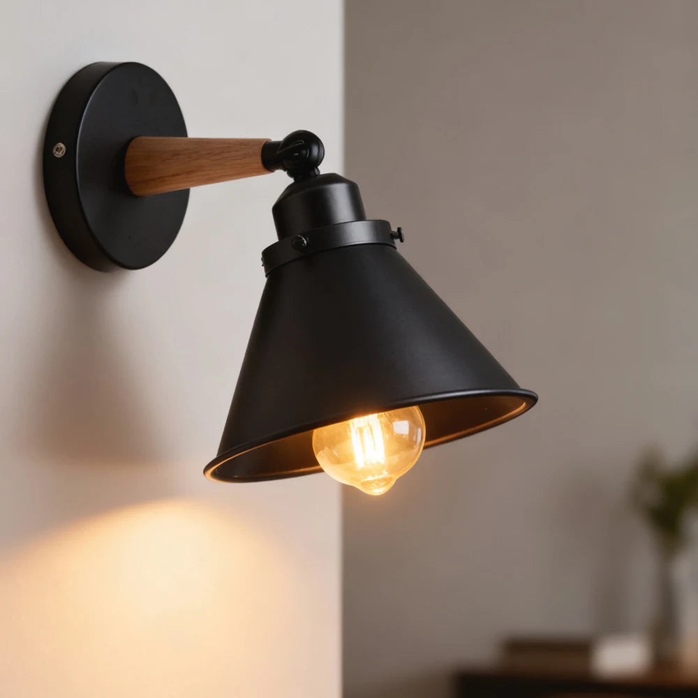 Wood and iron wall sconce mounted in bedroom