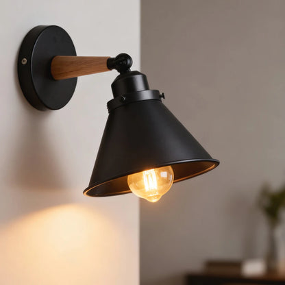 Wood and iron wall sconce mounted in bedroom