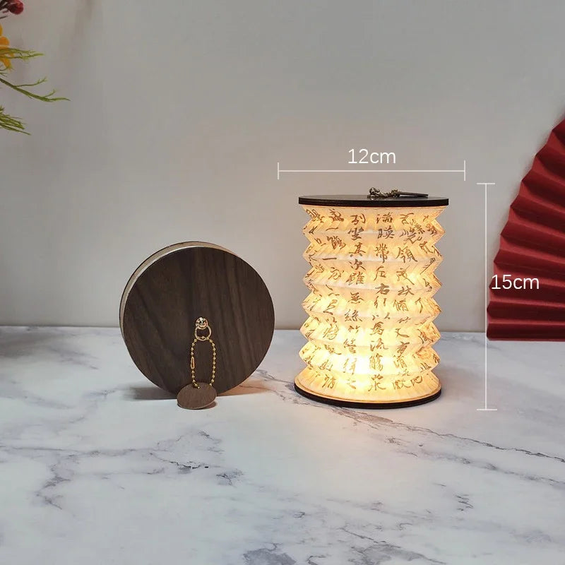 Folding lantern lamp on a windowsill at dusk