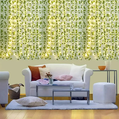 Green leaf curtain lights hung over a doorway
