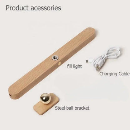 Wooden mirror light with adjustable LED positioned for bathroom mirror and grooming lighting