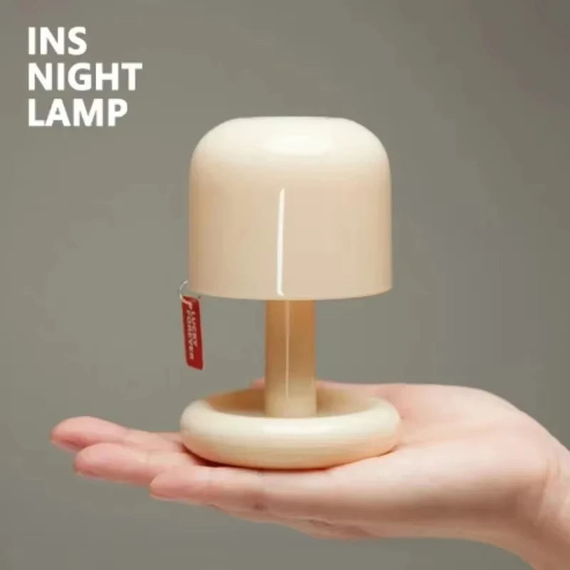 Mini LED sunset night light showing touch control button, USB rechargeable with auto-off timer