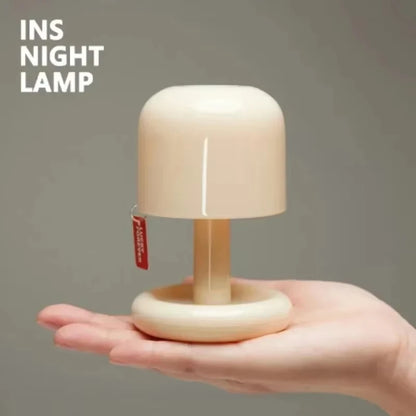 Mini LED sunset night light showing touch control button, USB rechargeable with auto-off timer
