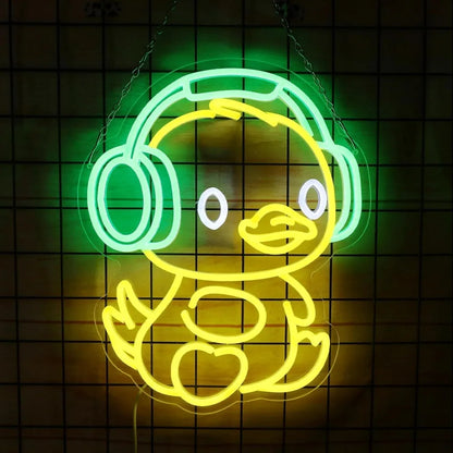Neon sign of a duck wearing headphones on a grid background