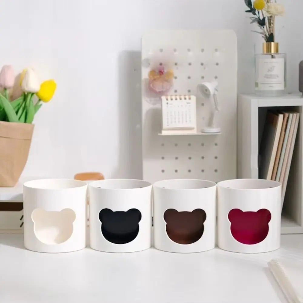 Round plastic pen holder with a small bear design, view 3