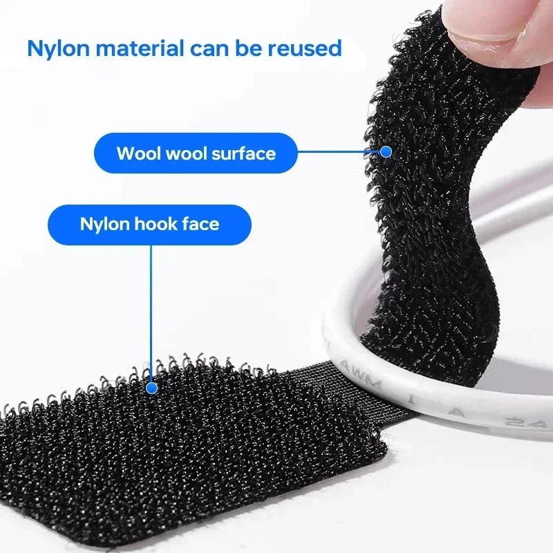 Grey reusable cable strap being adjusted