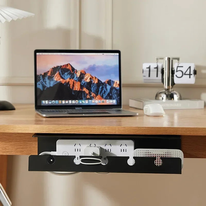 White no drilling cable basket clamped to a desk edge
