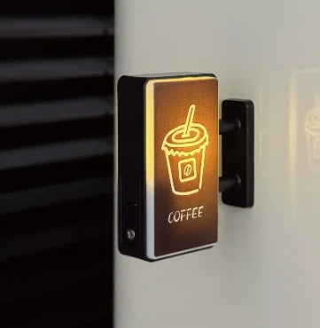 Coffee corner magnets arranged on a kitchen shelf