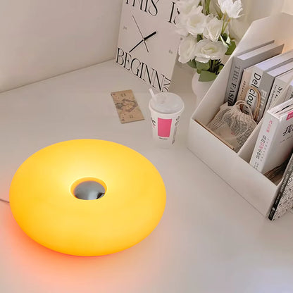 RGB donut lamp glowing in bedroom decor
