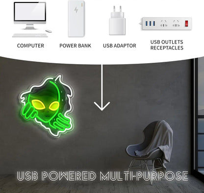 Neon sign with USB power symbol on a dark wall with electronic devices above.