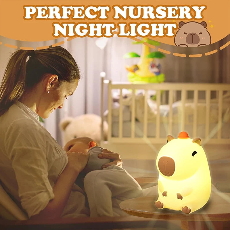 Woman holding a baby with a night light in a nursery setting