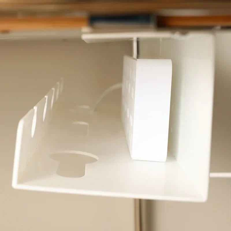Close up of the clamp gripping the desktop