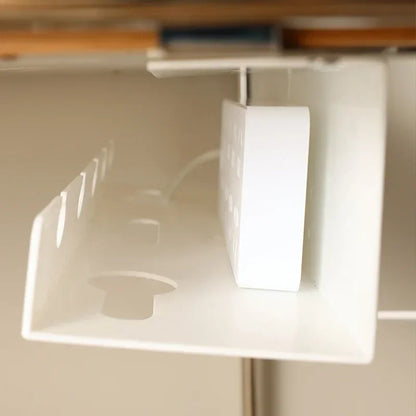Close up of the clamp gripping the desktop