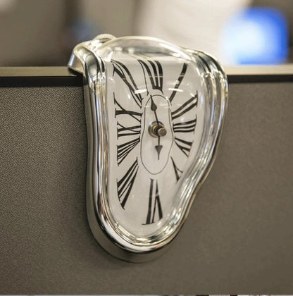 Back of the melted clock showing the AA battery box