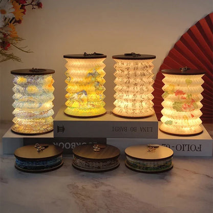 Portable lantern lamp opened out and glowing on a table